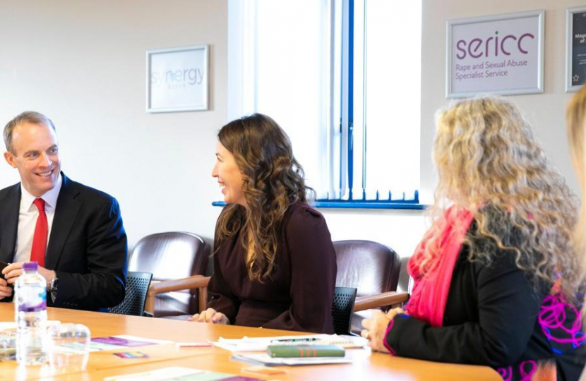 Dominic talking with staff who support victims of rape